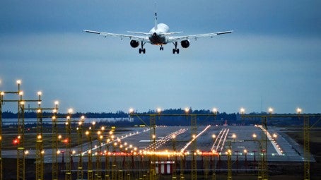 Plane landing on an airstrip