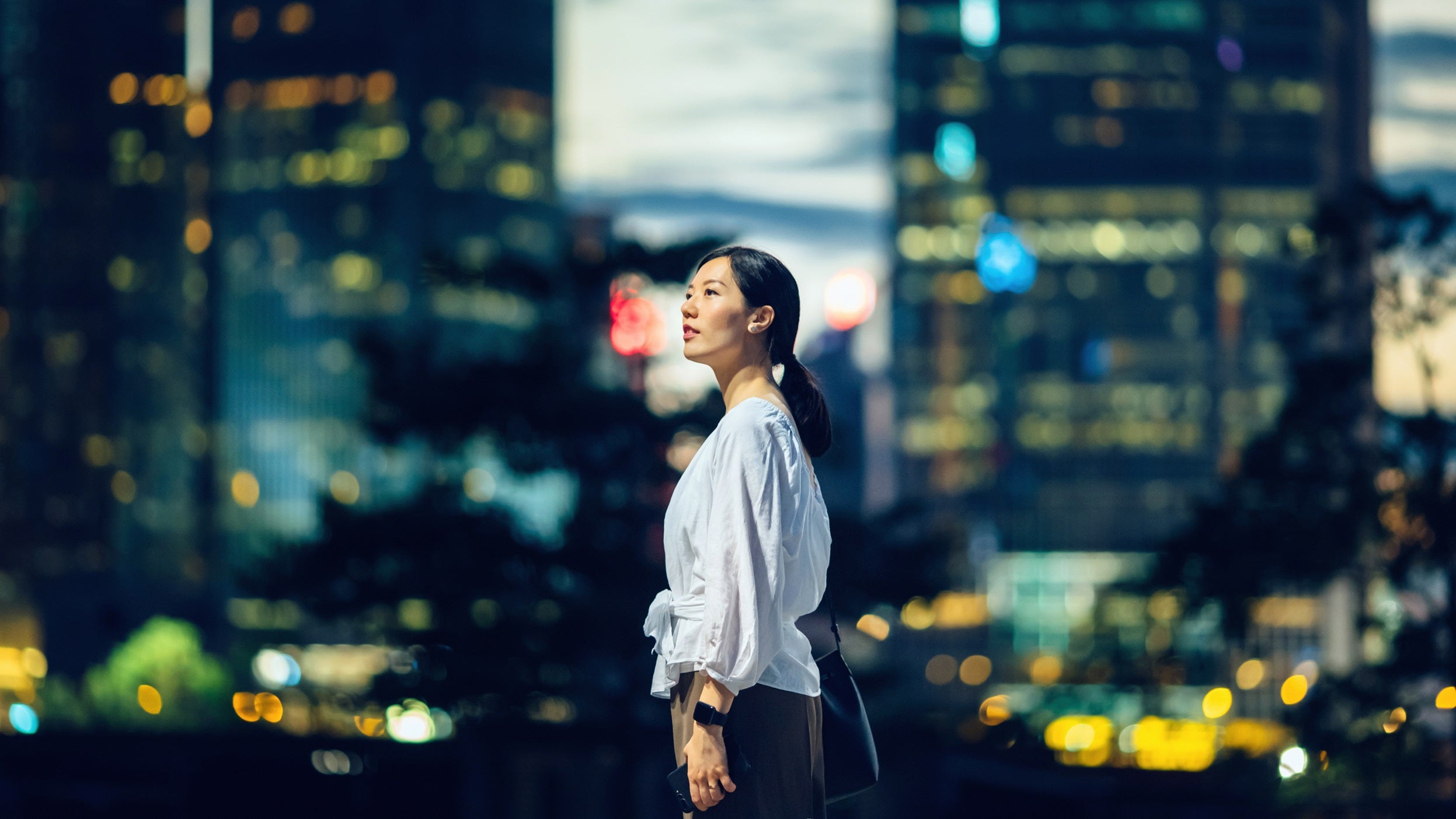 Woman staring outside the window