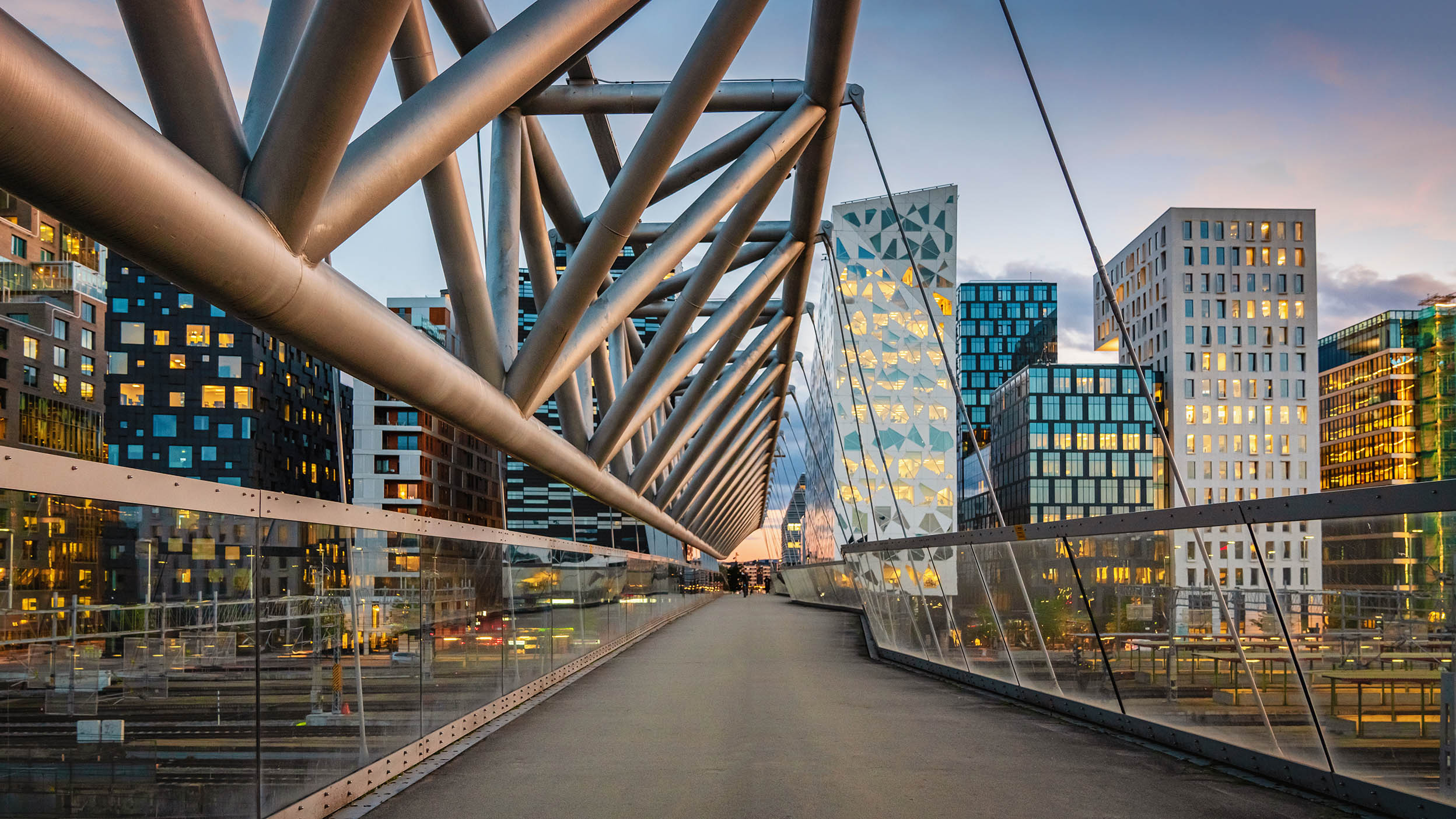 A bridge surrounded by buildings.