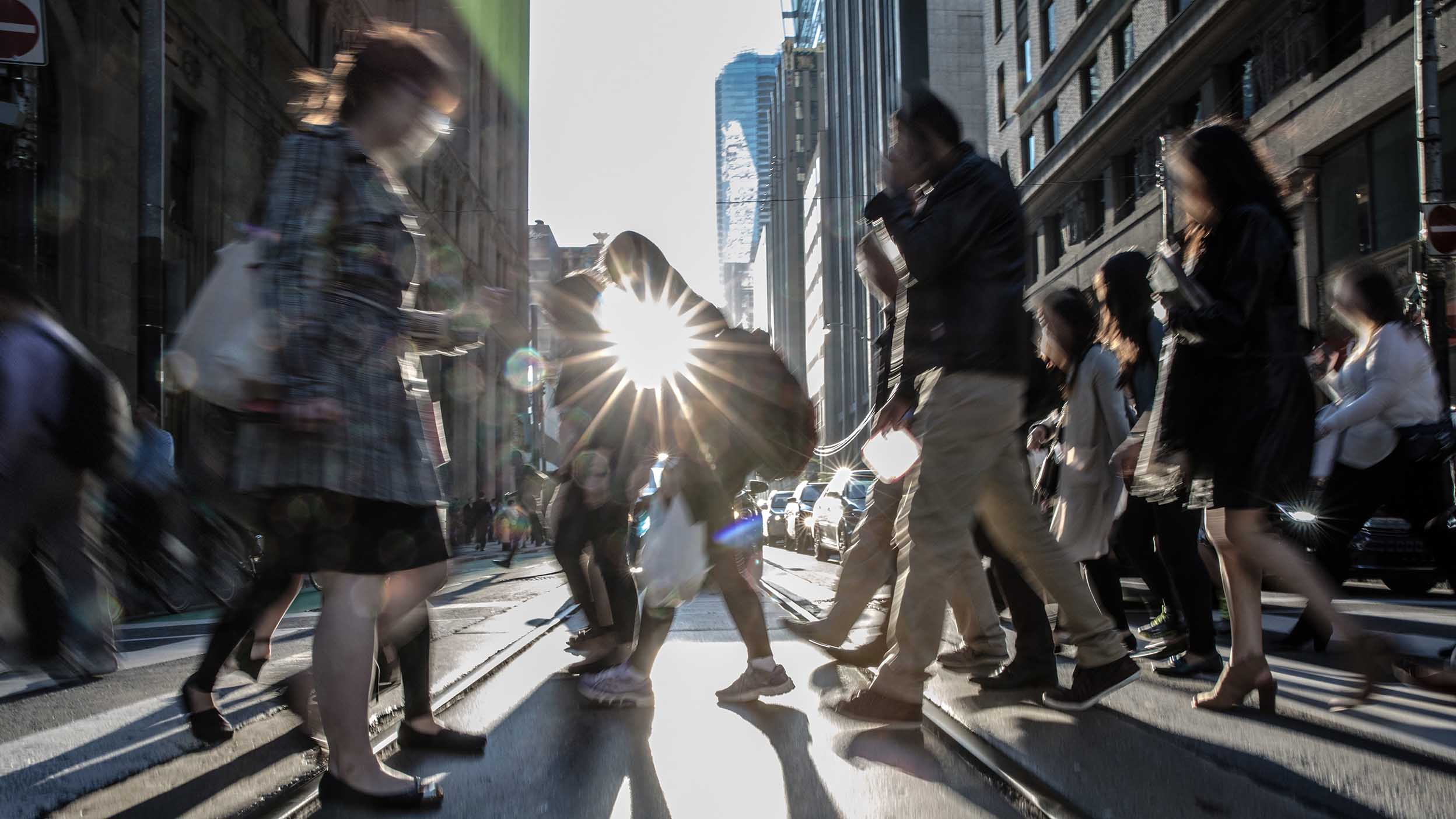 People crossing the busy streets