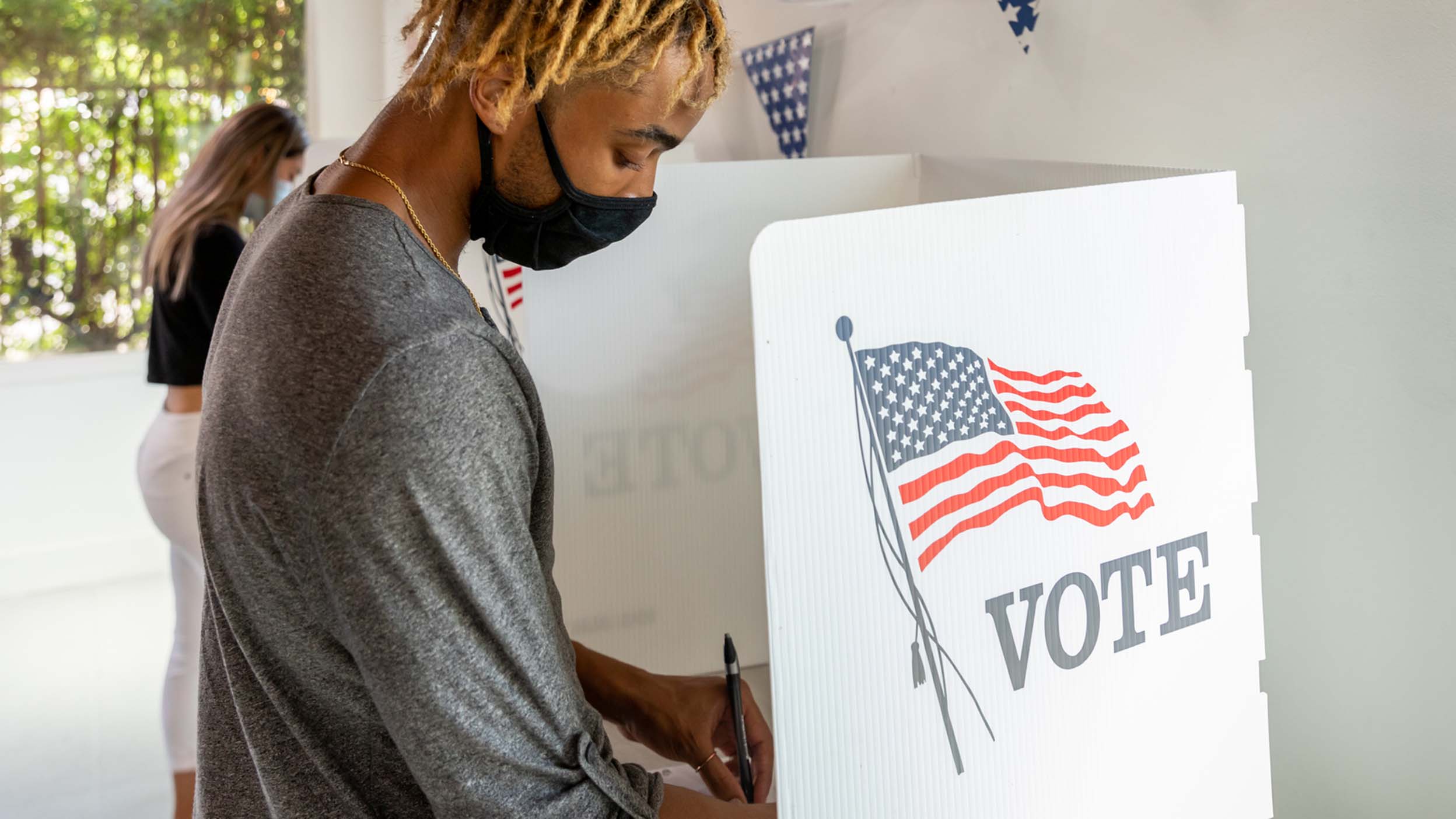 man casting vote