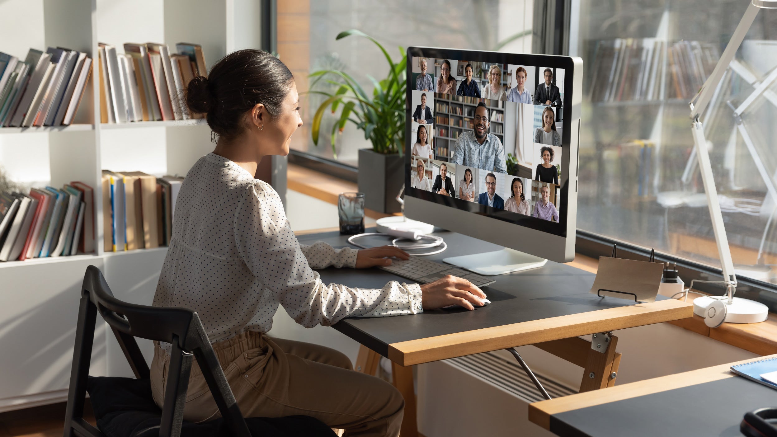 Woman on webinar in home office