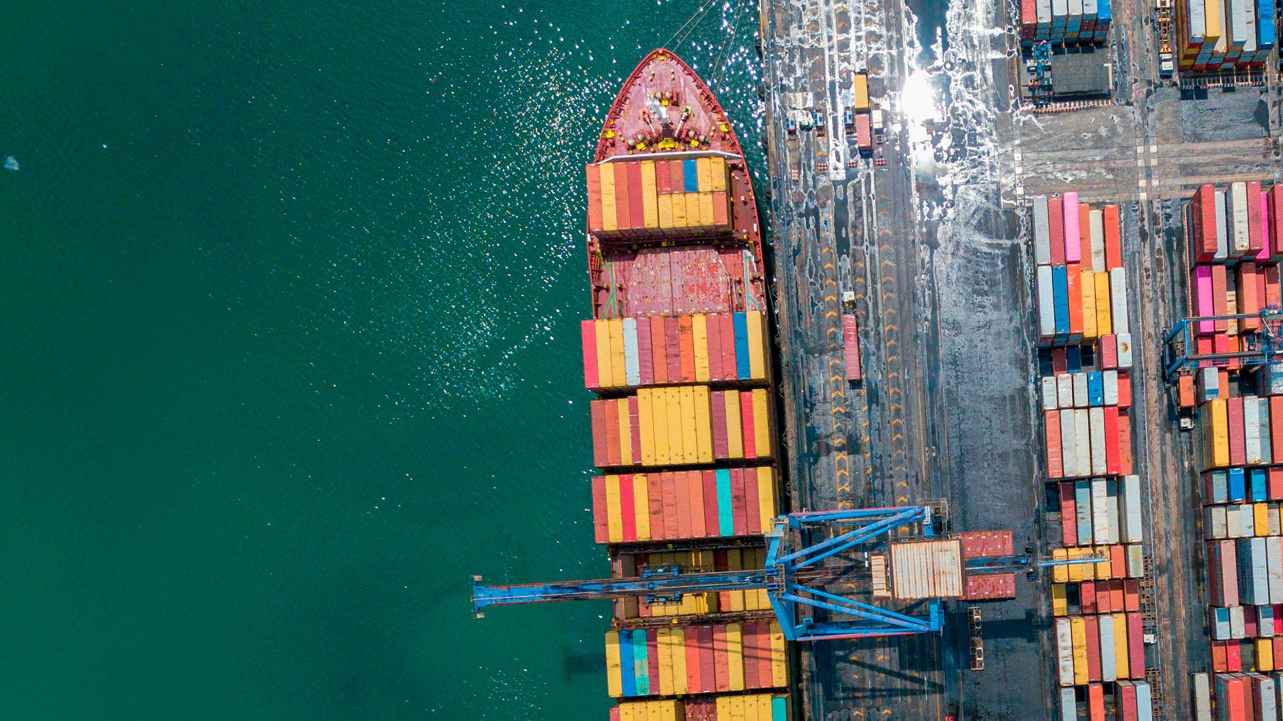 Overhead view of cargo ship in a dock