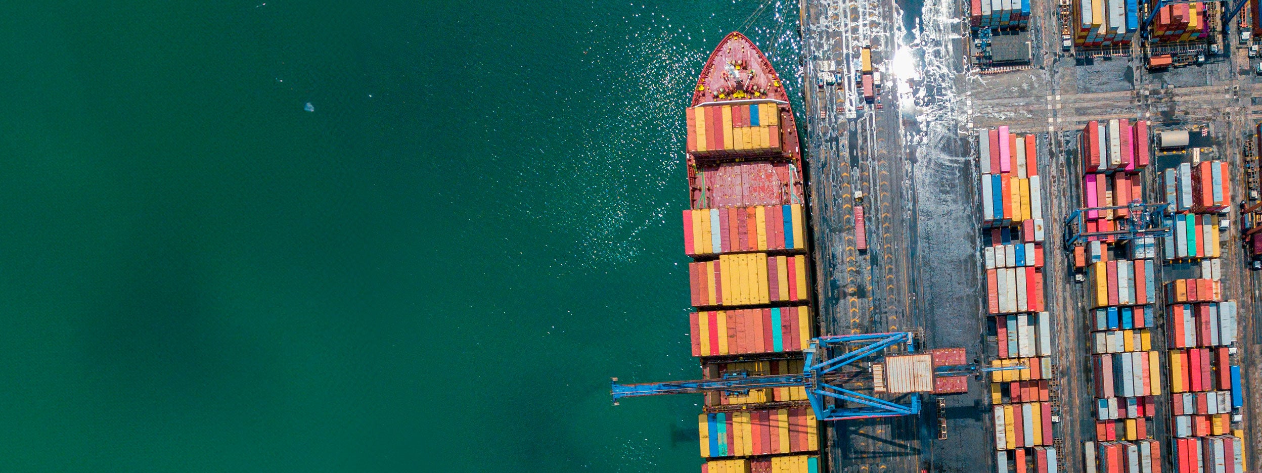 Aerial view of cargo ship in dock