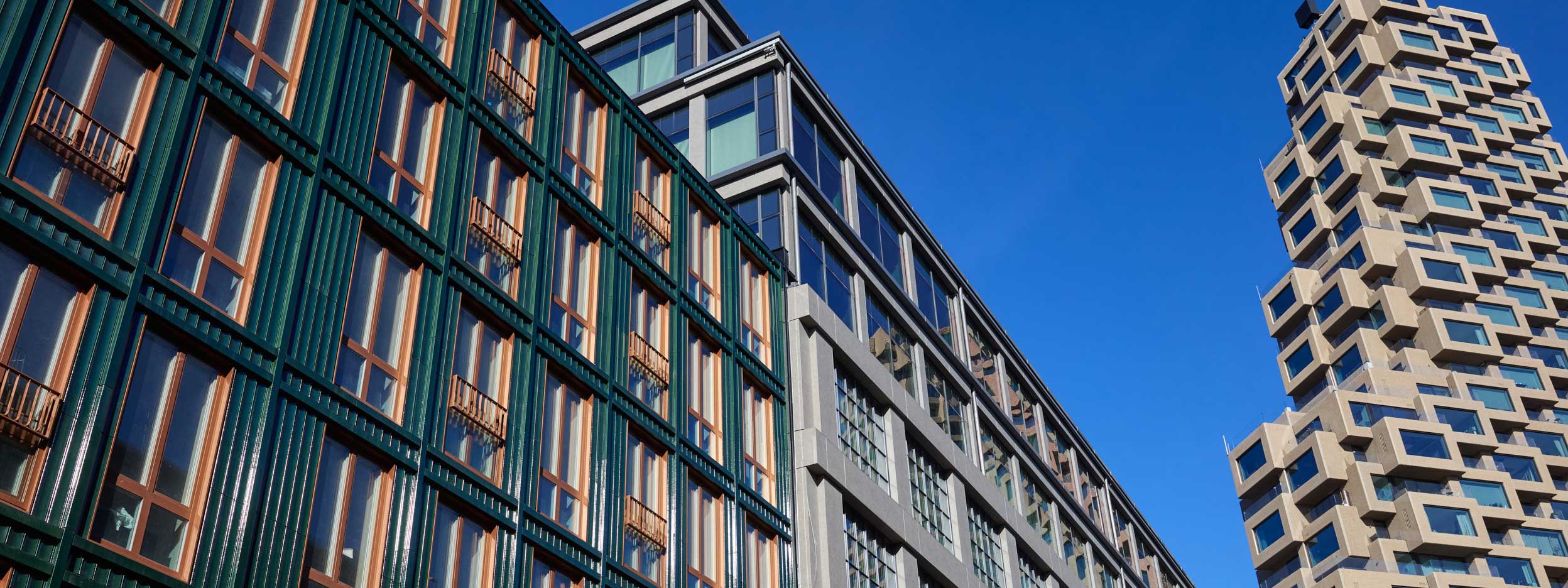 A high-rise building in Stockholm, with an abundance of windows, representing modern architectural design.