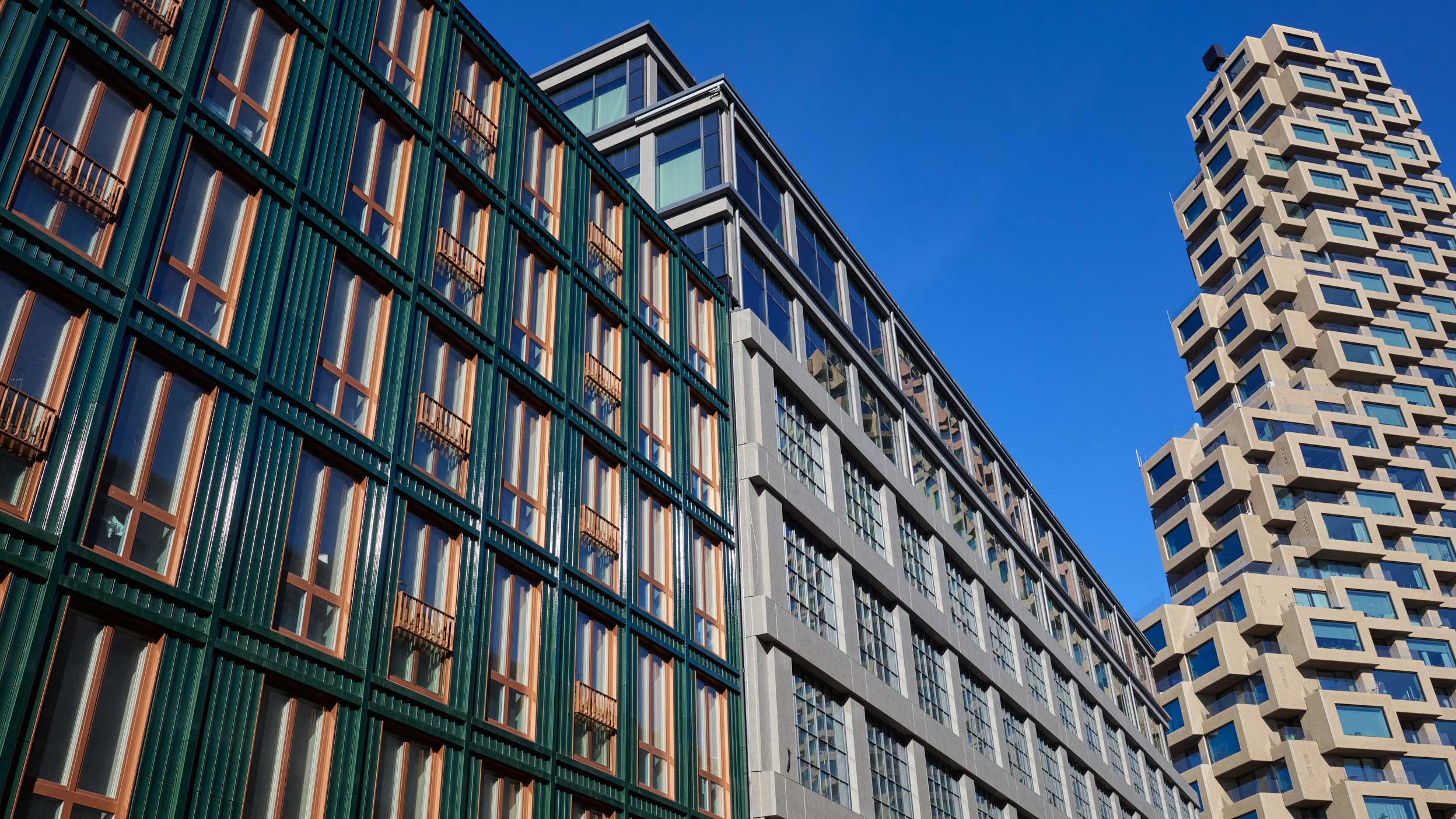 A high-rise building in Stockholm, with an abundance of windows, representing modern architectural design.