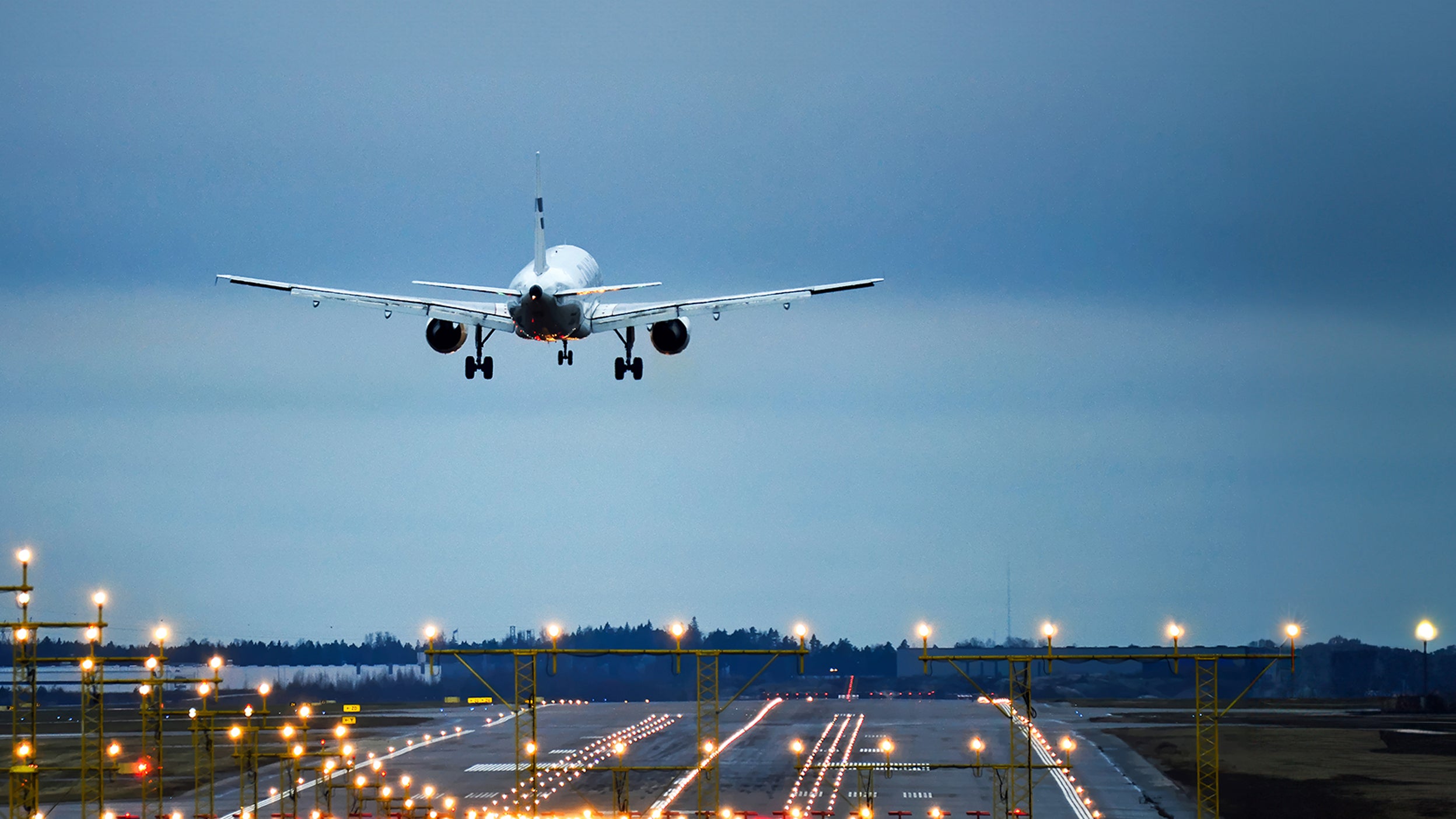 Plane landing on runway