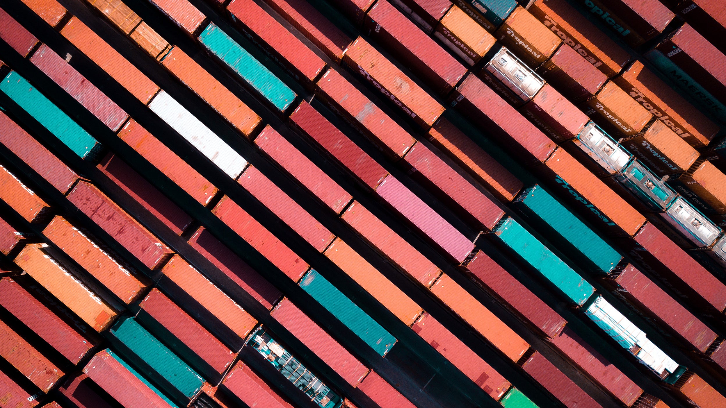 Aerial view Of cargo boxes in a shipyard and dock