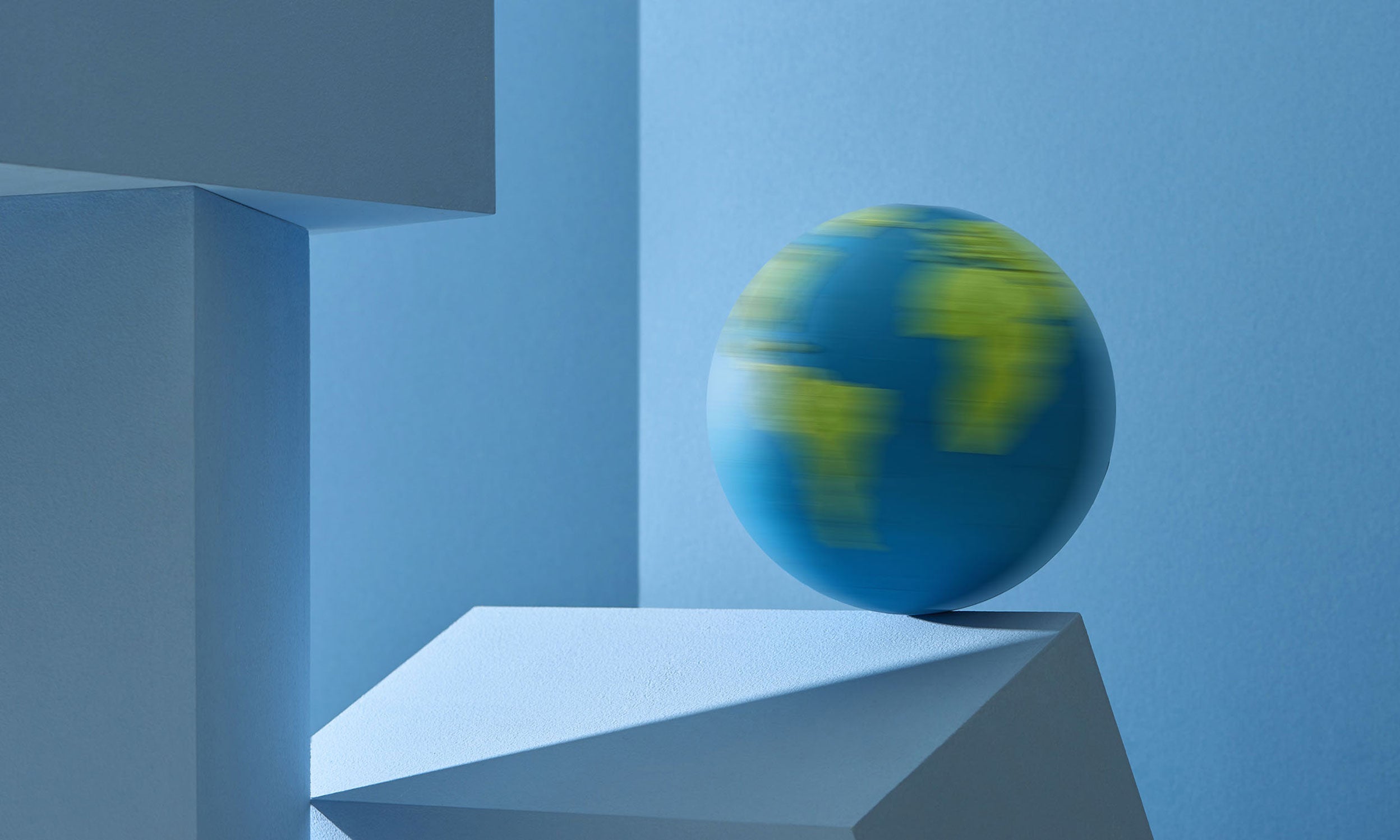 Rotating globe on platform