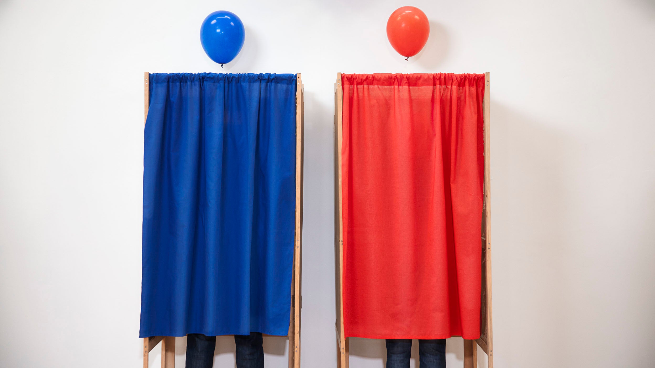 Voters voting in polling place