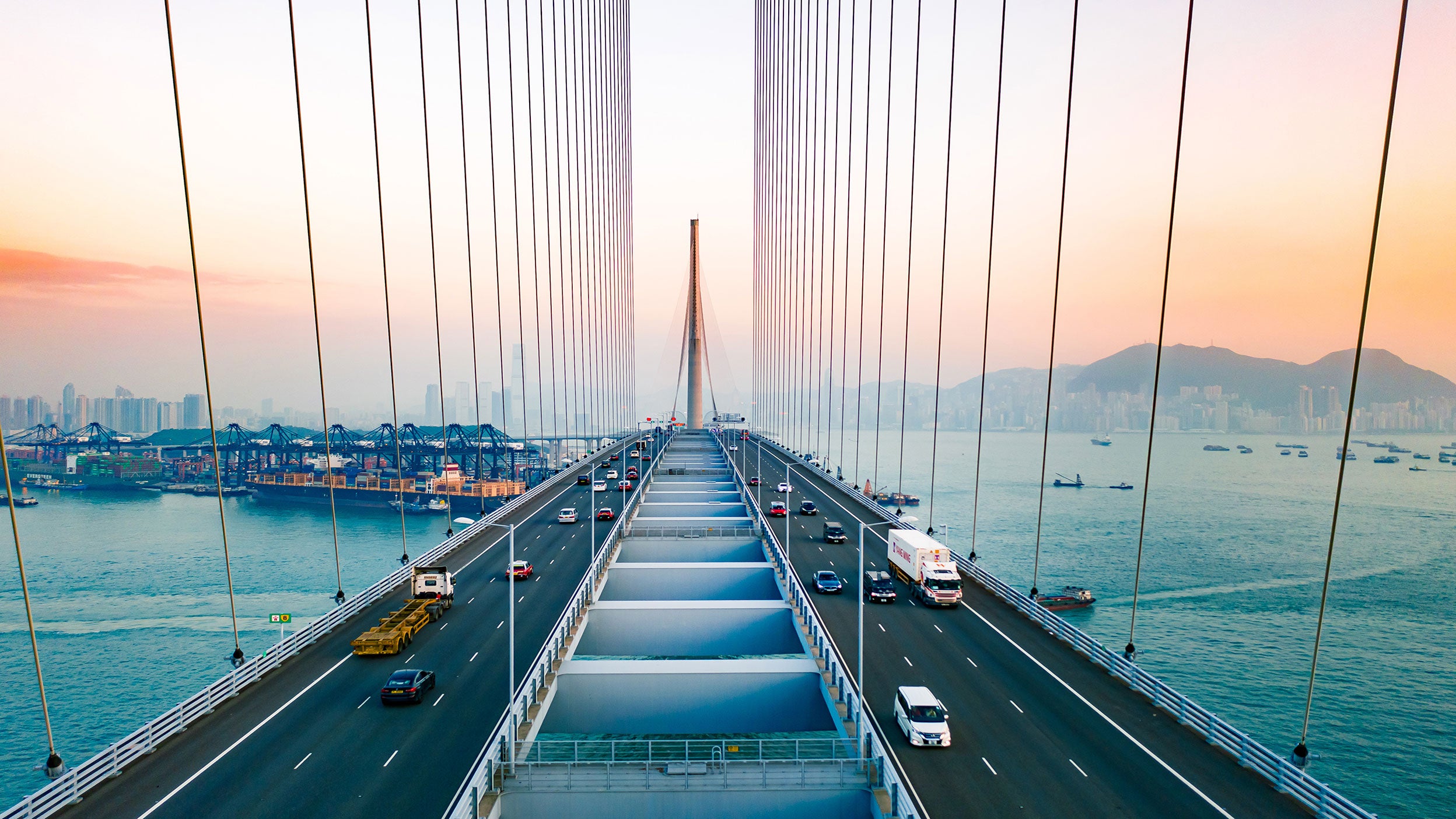 Cars on a suspension bridge