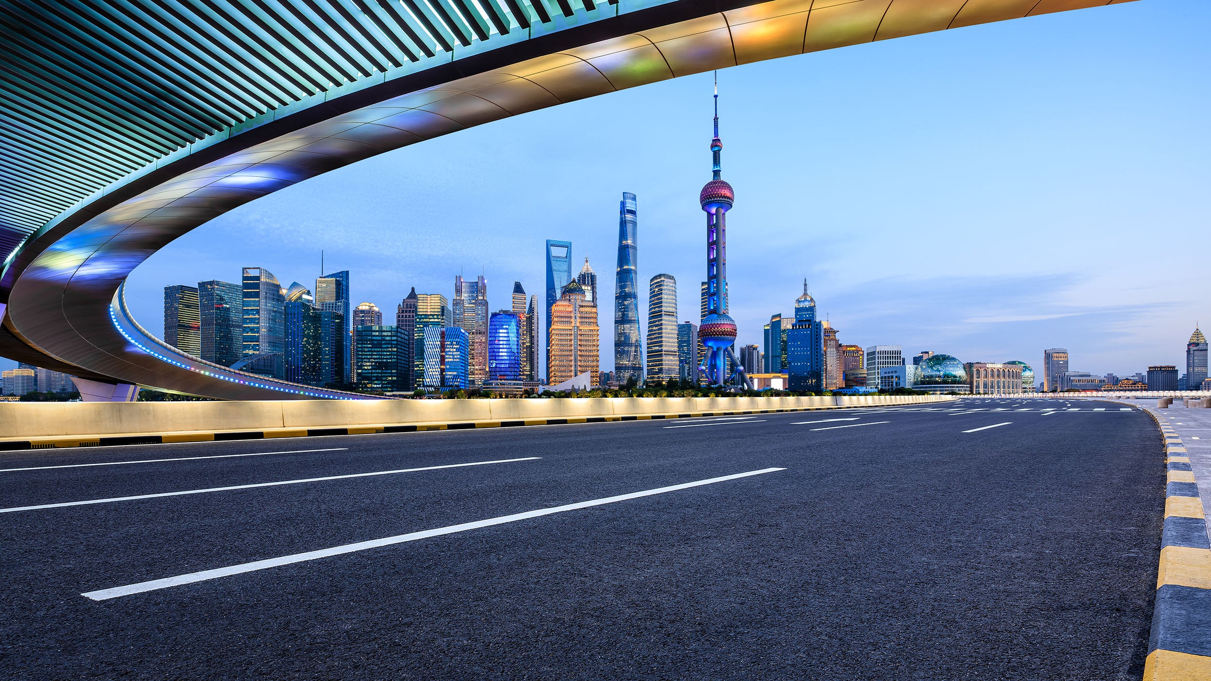 Asphalt highway and city skyline in Shanghai