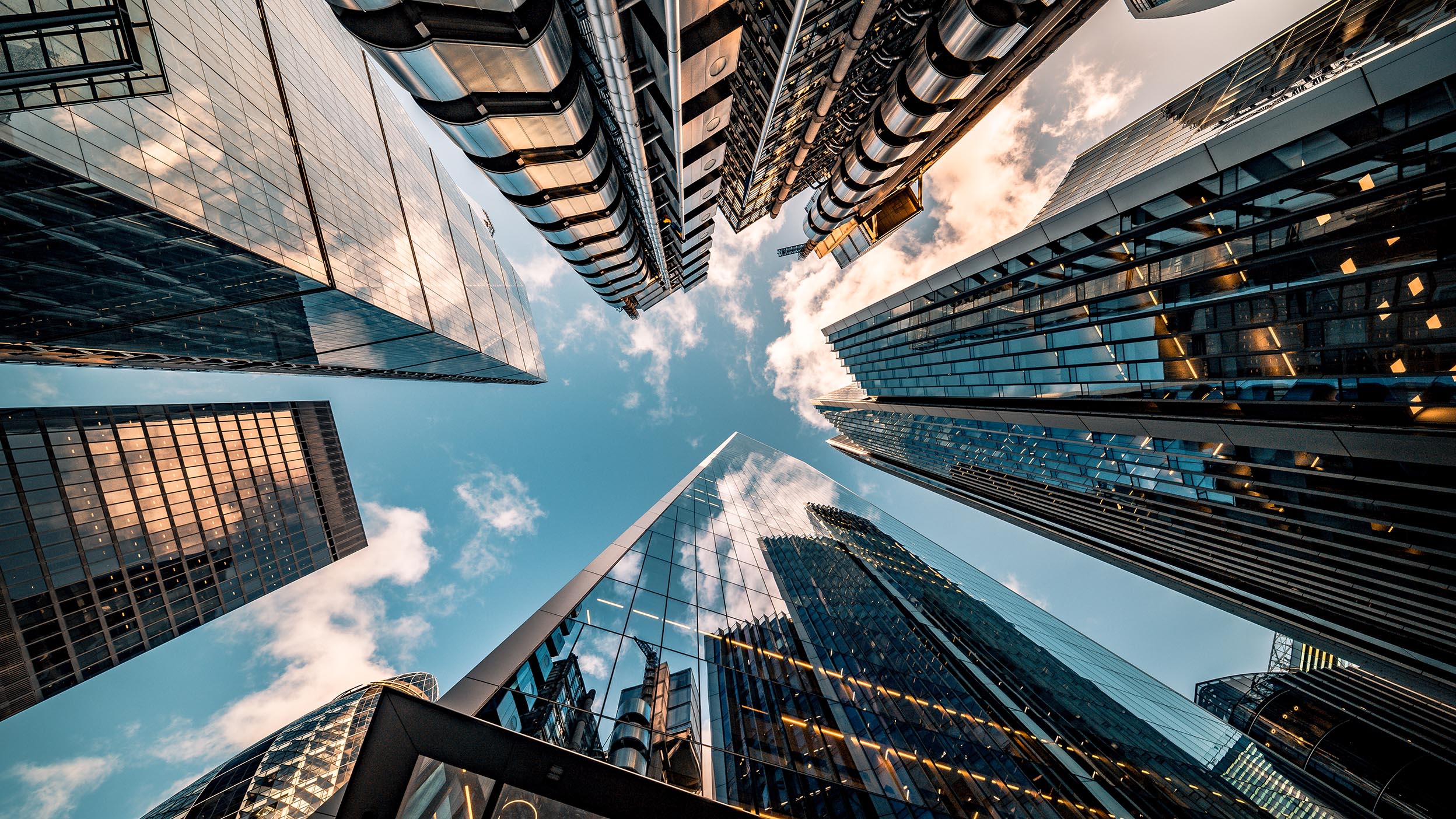 View of sky from cityscape below. 