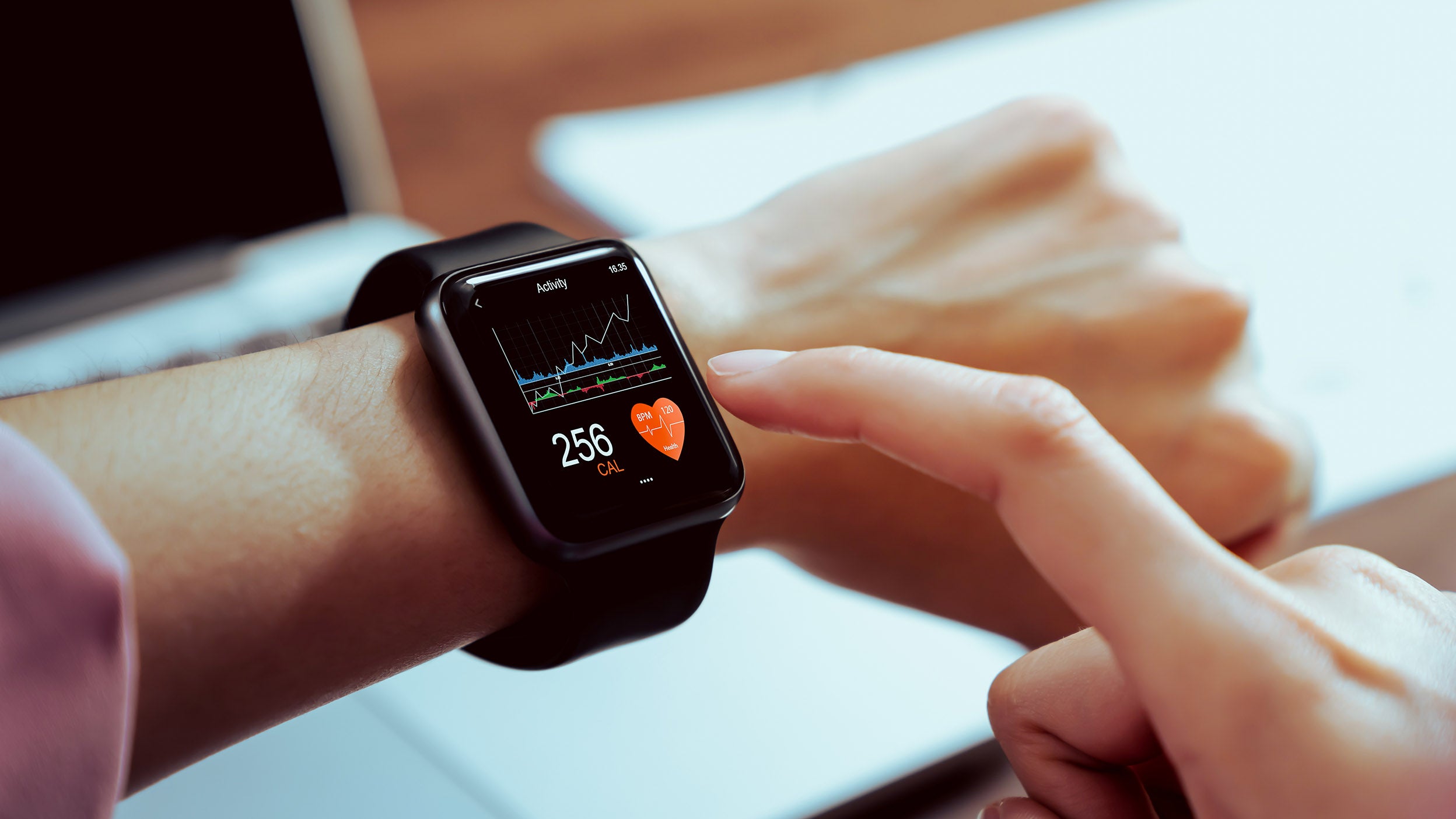 Man looking at his apple watch