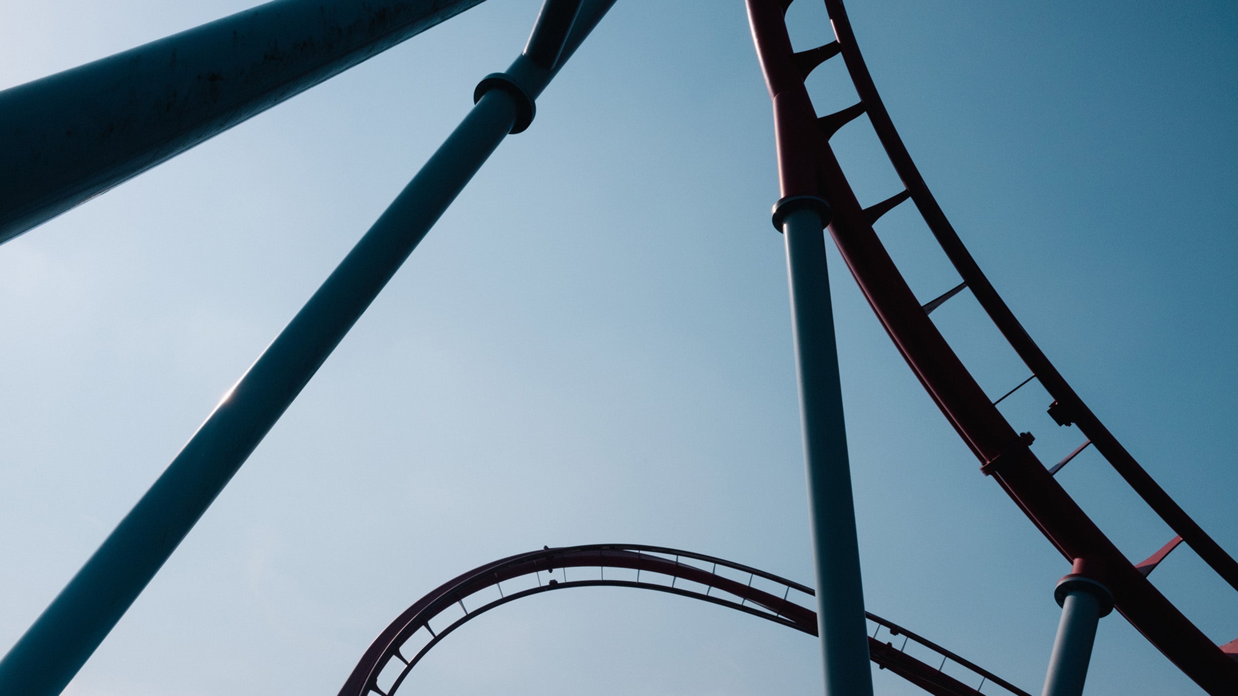 A worm’s-eye view of the twists and turns of a rollercoaster.