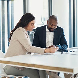 Two%20persons%20discussion%20in%20the%20office%20room.