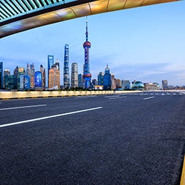 Asphalt%20highway%20and%20city%20skyline%20in%20Shanghai