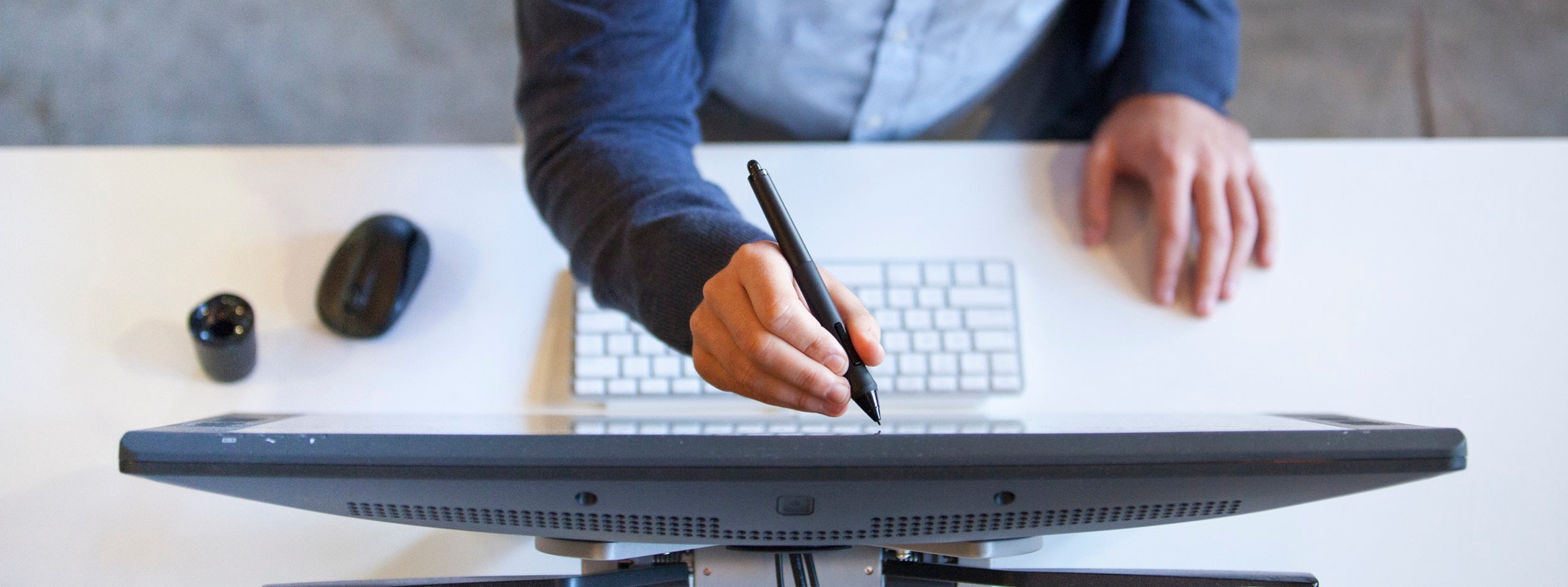 man typing on computer